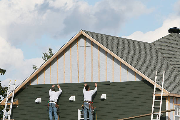 Professional Siding technician working in Merion Station, PA